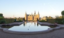 Frederiksborg Palace  is surrounded by a beautiful garden